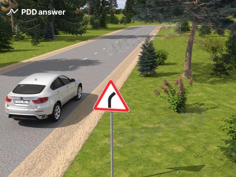 Разрешается ли водителю легкового автомобиля остановиться на повороте дороги, обозначенном таким дорожным знаком, если видимость дороги в обоих направлениях составляет более 100 метров?