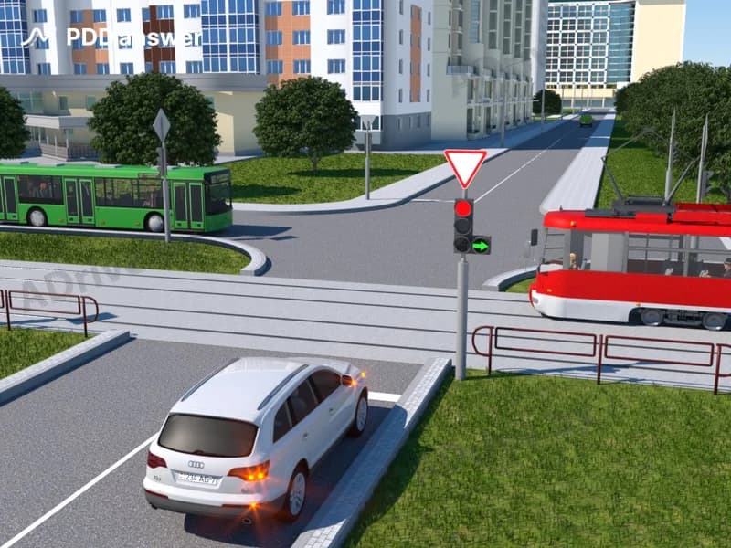 Как в показанной ситуации должен поступить водитель белого легкового автомобиля?