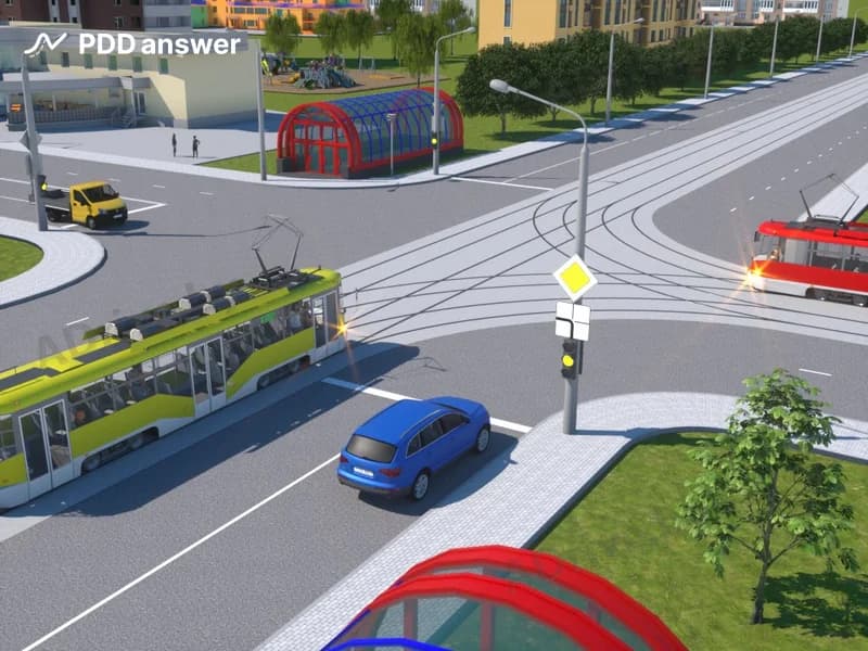 В показанной ситуации (на светофоре включён жёлтый мигающий сигнал) при движении прямо водитель легкового автомобиля: