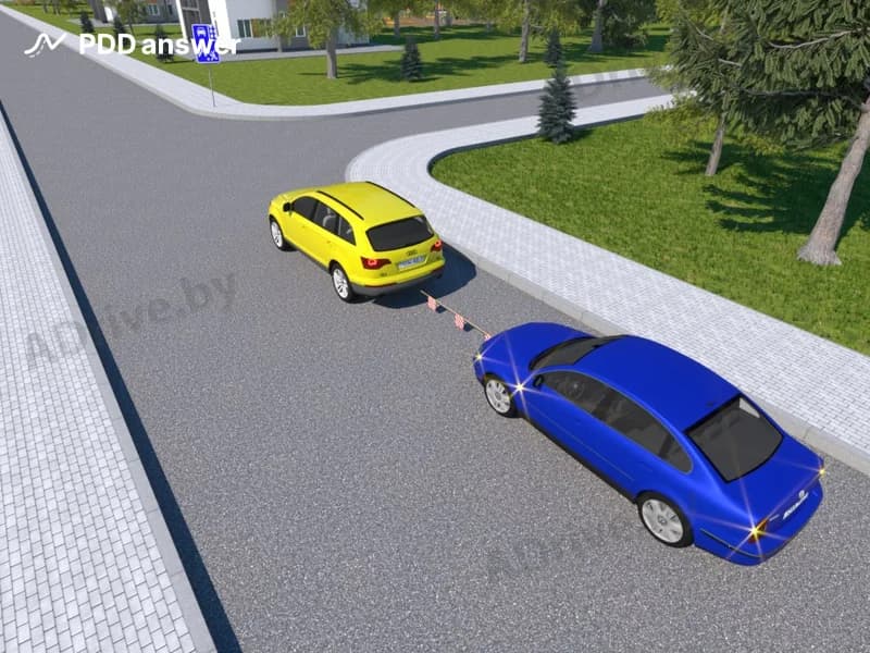 Буксировка неисправного автомобиля производится со скоростью 50 км/ч. До какого максимального значения необходимо снизить скорость при въезде на участок дороги, обозначенный таким дорожным знаком?