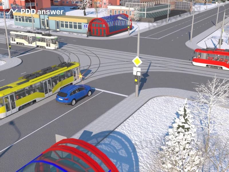 В показанной ситуации (на светофоре включён жёлтый мигающий сигнал) при движении прямо водитель легкового автомобиля: