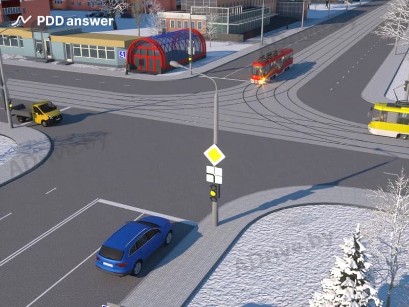 В показанной ситуации (на светофоре включён жёлтый мигающий сигнал) при движении прямо водитель легкового автомобиля: