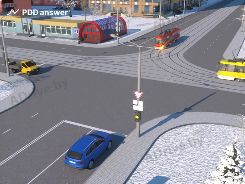 В показанной ситуации (на светофоре включён жёлтый мигающий сигнал) при движении прямо водитель легкового автомобиля:
