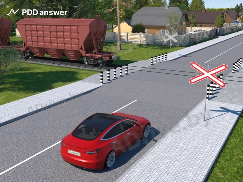 Как должен поступить водитель легкового автомобиля, если через переезд только что проследовал поезд?