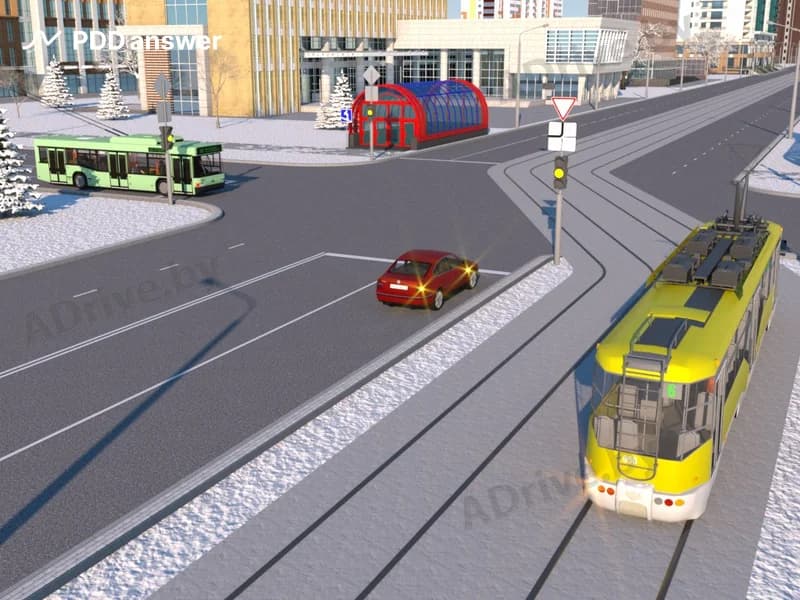 В показанной ситуации (на светофоре включён жёлтый мигающий сигнал) при повороте направо водитель легкового автомобиля: