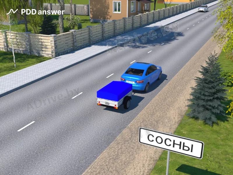 С какой максимальной скоростью разрешается движение легковому автомобилю с прицепом по дороге в населённом пункте?