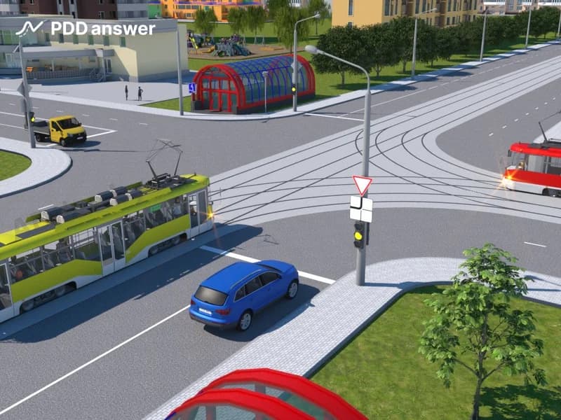 В показанной ситуации (на светофоре включён жёлтый мигающий сигнал) при движении прямо водитель легкового автомобиля: