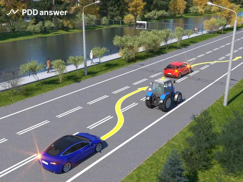 Нарушают ли водители синего и красного легковых автомобилей Правила дорожного движения, перестраиваясь в показанной ситуации, учитывая, что реверсивный светофор только что выключился?