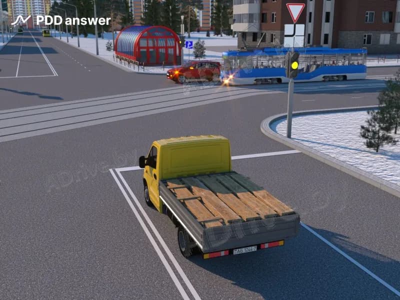 В показанной ситуации (на светофоре включён жёлтый мигающий сигнал) при повороте налево водитель легкового автомобиля: