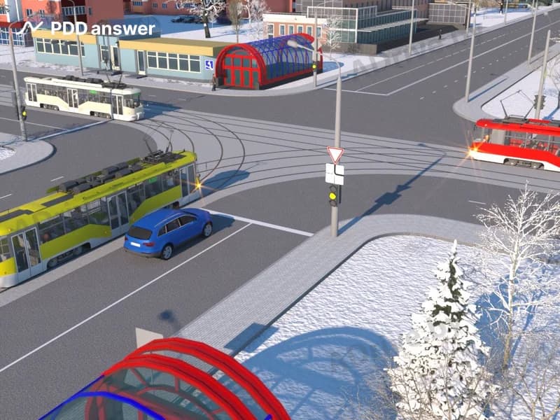 В показанной ситуации (на светофоре включён жёлтый мигающий сигнал) при движении прямо водитель легкового автомобиля: