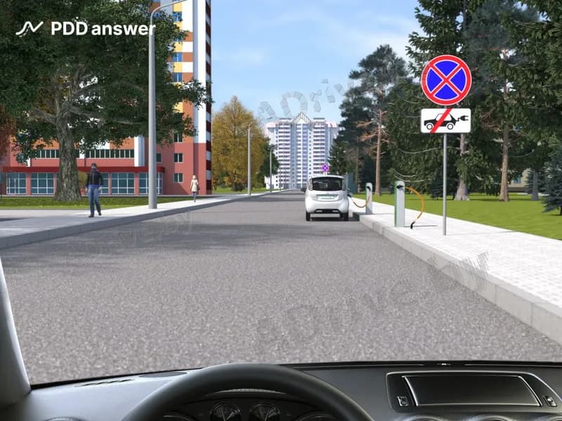 Разрешается ли Вам, управляя автомобилем, приводимым в движение двигателем внутреннего сгорания, остановиться справа за дорожным знаком для высадки пассажира?