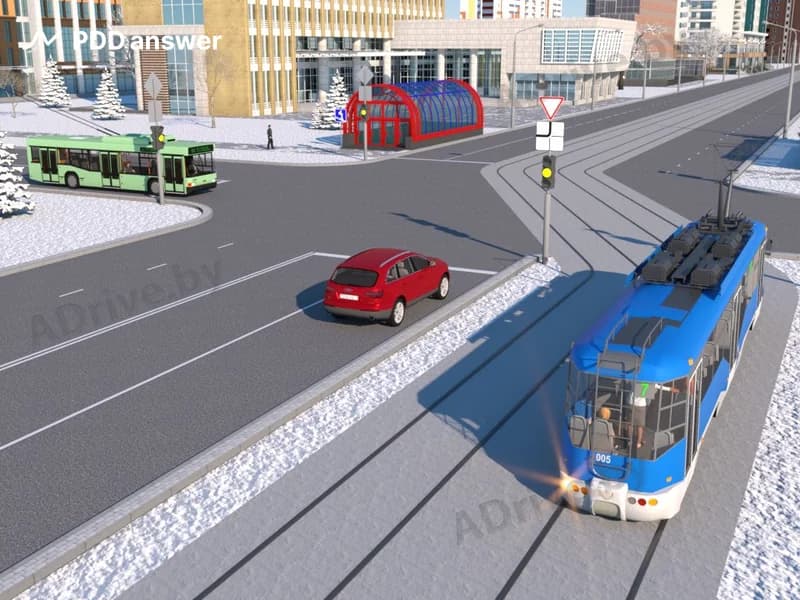 В показанной ситуации (на светофоре включён жёлтый мигающий сигнал) при движении прямо водитель легкового автомобиля: