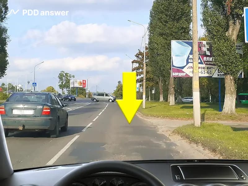 Является ли перекрёстком показанное стрелкой место примыкания дороги?