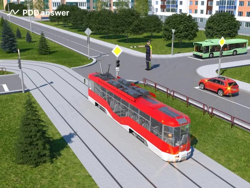 Как в показанной ситуации должен поступить водитель красного легкового автомобиля, если ему необходимо повернуть налево?