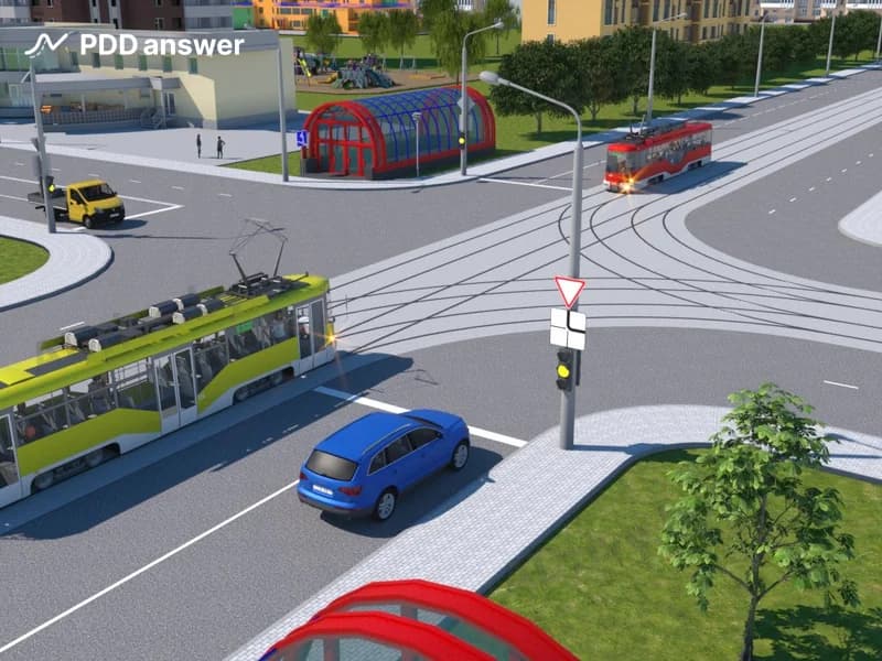 В показанной ситуации (на светофоре включён жёлтый мигающий сигнал) при движении прямо водитель легкового автомобиля: