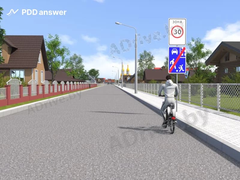 Разрешается ли велосипедисту продолжить движение по проезжей части дороги в показанной ситуации?