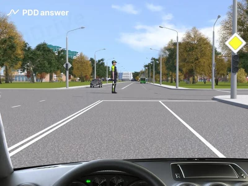 Как Вам следует поступить в показанной ситуации, если Вам необходимо повернуть налево?