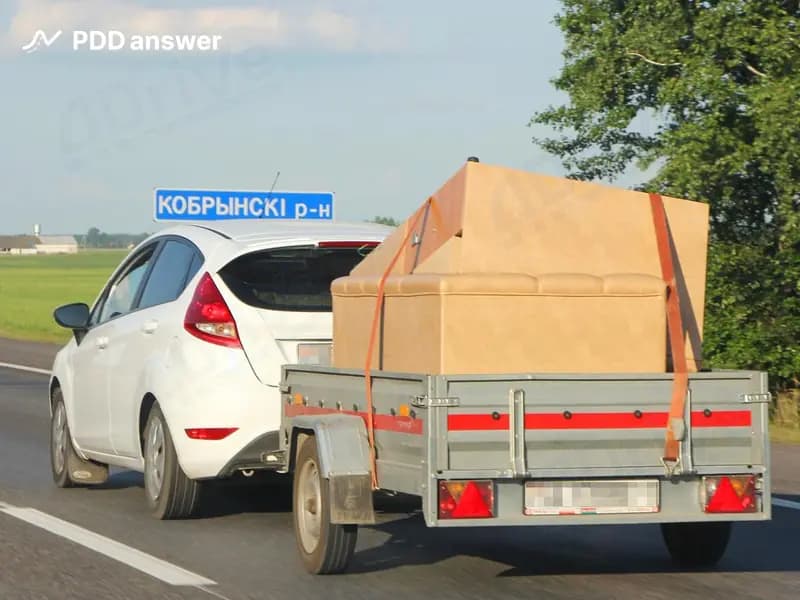 Что из нижеперечисленного не требуется для участия в дорожном движении легковому автомобилю с прицепом?