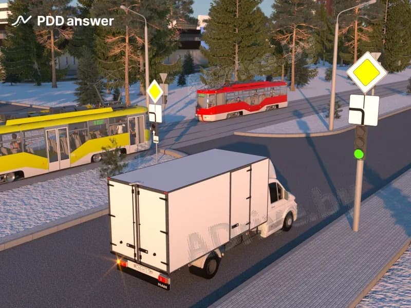 При проезде показанного на рисунке перекрёстка водитель грузового автомобиля: