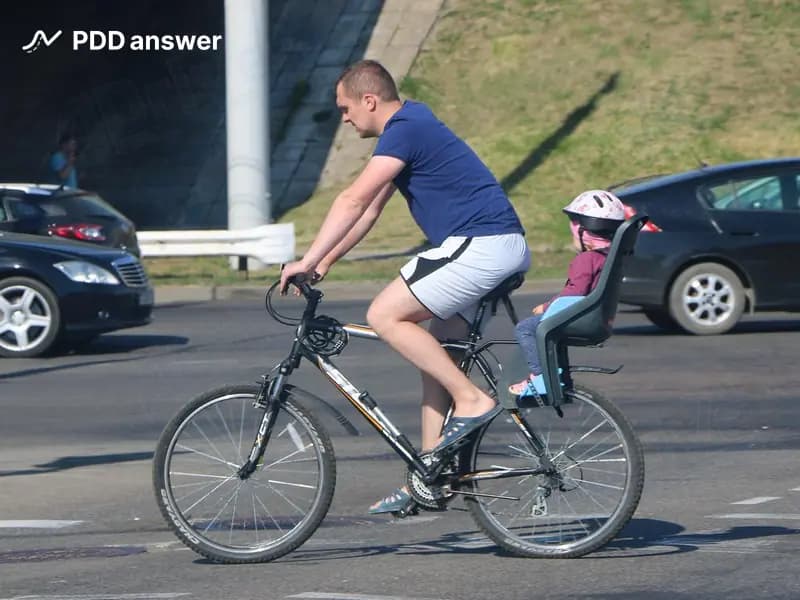 Какие обязательные требования должны соблюдаться при перевозке ребёнка на велосипеде?