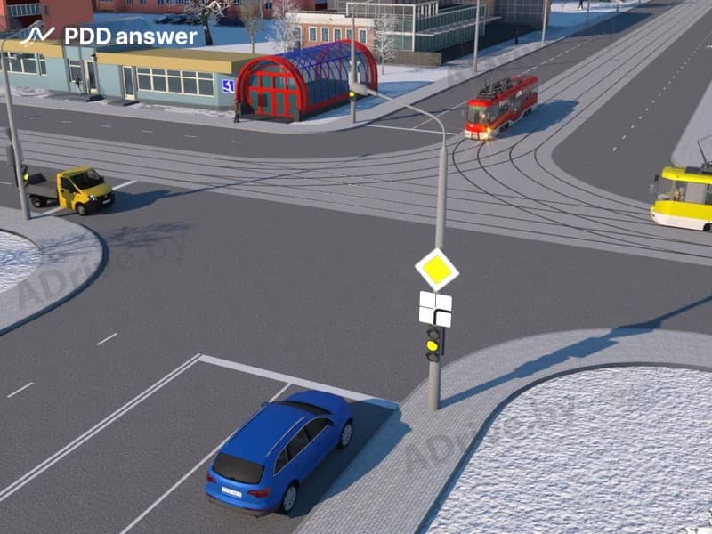 В показанной ситуации (на светофоре включён жёлтый мигающий сигнал) при движении прямо водитель легкового автомобиля: