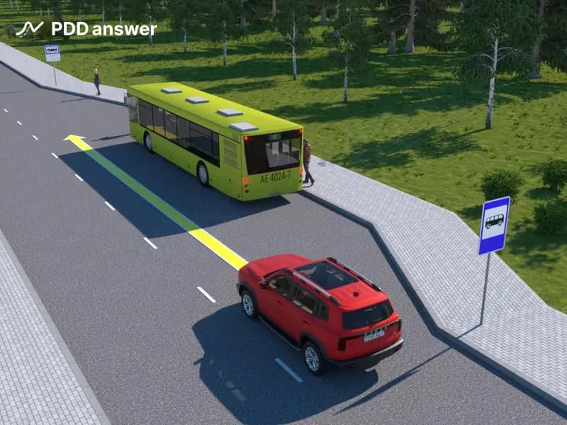 Как следует поступить в показанной ситуации водителю красного легкового автомобиля?