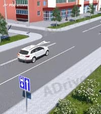 Разрешено ли водителю белого автомобиля повернуть налево во двор?