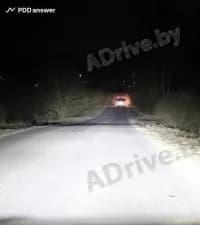 Двигаясь в тёмное время суток вне населённого пункта с включёнными фарами дальнего света, Вы догнали движущееся впереди транспортное средство. Ваши действия?